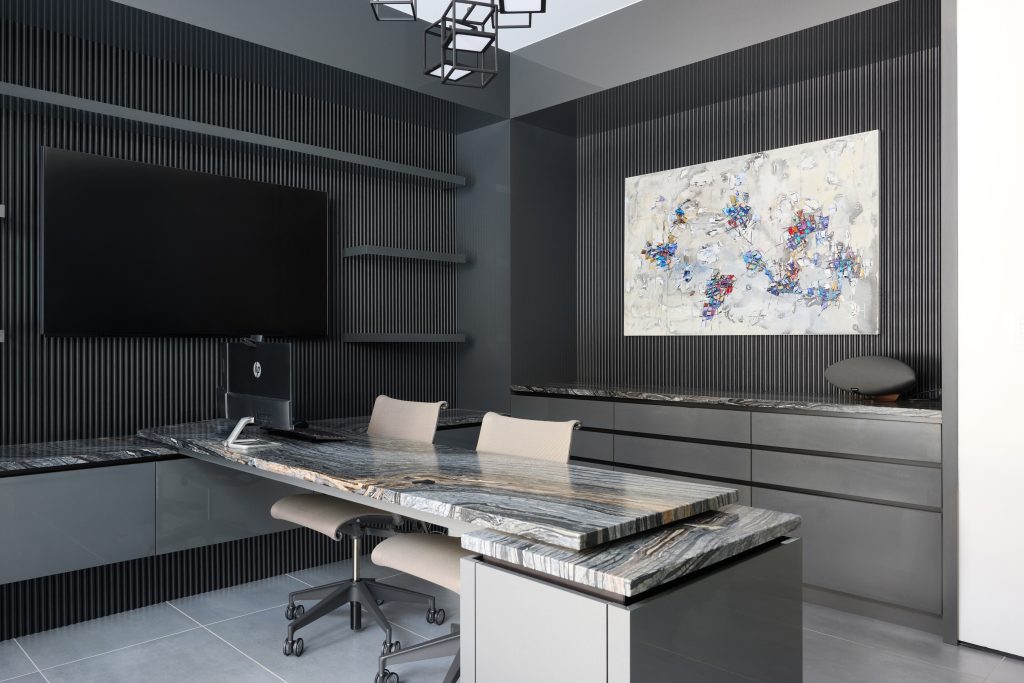 The Moonlight Study — a tonal, minimalist workspace with fluted matte wall paneling, floating Silver Wave quartzite desk, and seamless anthracite cabinetry.