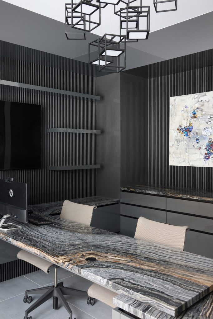 The Moonlight Study — a tonal, minimalist workspace with fluted matte wall paneling, floating Silver Wave quartzite desk, and seamless anthracite cabinetry.